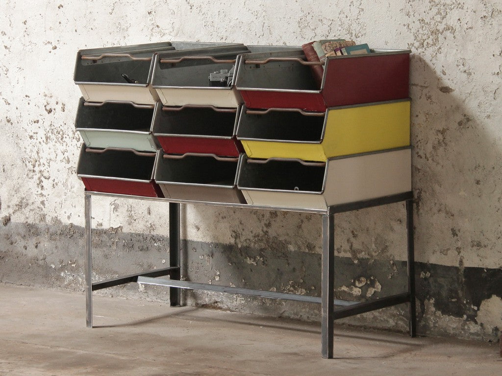 Our industril designer Jasn has crreated this rack for a set of painted old Tote tins