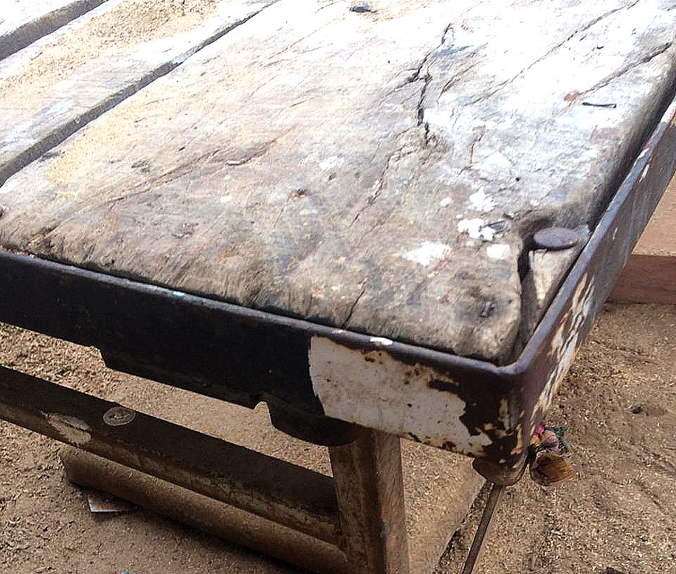 Metal framed vintage table in its 'found' condition before our expert artisans have restored it