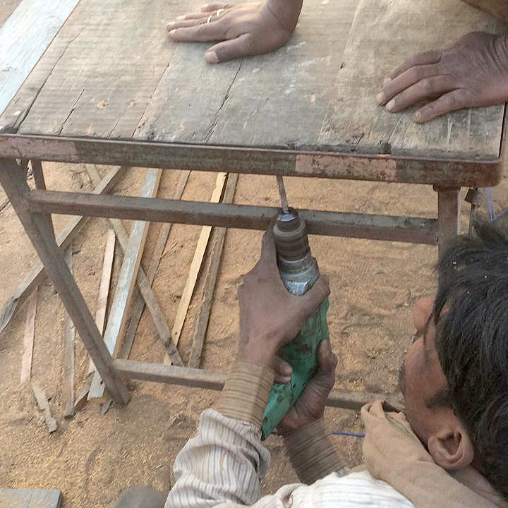 Expert Restorers Sankar can be seen here fixing the vintage table top back into place