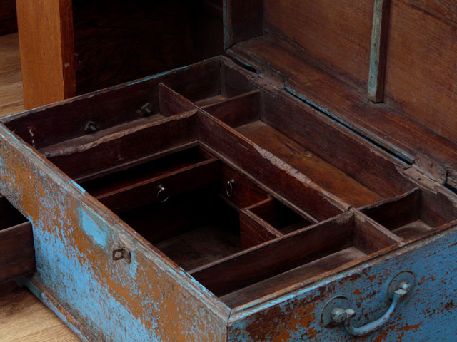 The interior of a blue merchant's chest